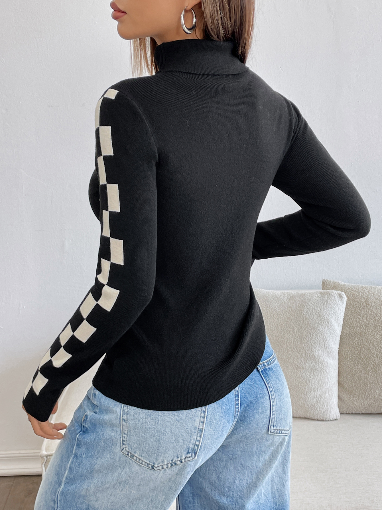 Checkmate Knit – Sleek Black Turtleneck with Side Game